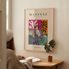 Matisse Art Prints - Reclining Woman Striped Robe Abstract Print framed poster in a cozy interior setting.
