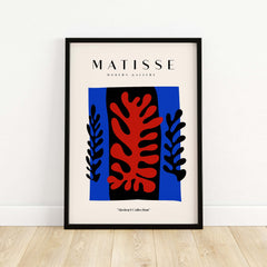Matisse Art Prints -  Red Coral Black Leaves Blue Frame Poster displayed in a modern gallery setting.