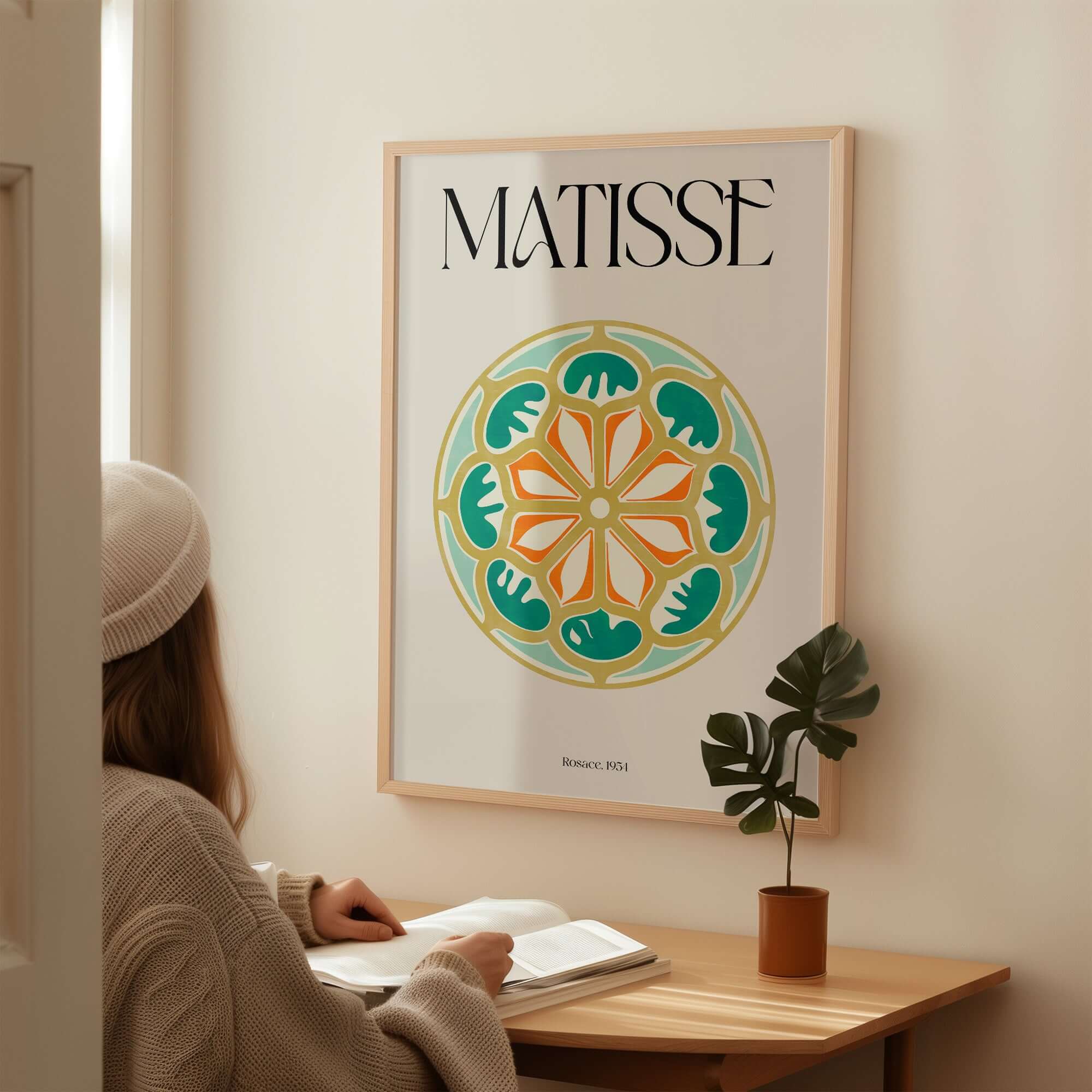 Matisse Art Print Rosace 1954 Rose Window Geometric Art Print displayed on a wall with a person admiring it.