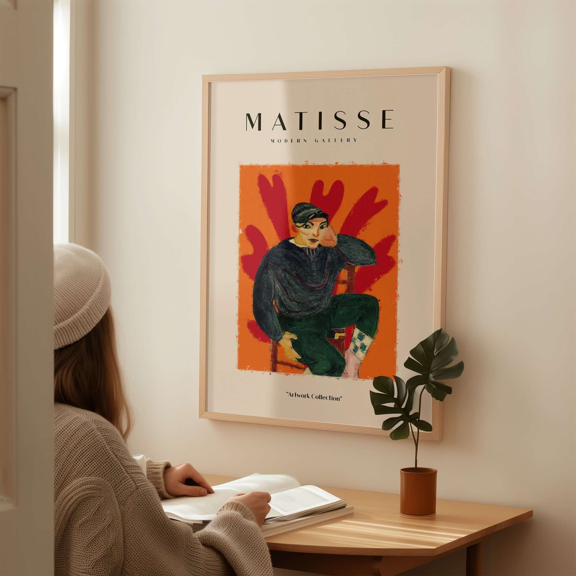 Matisse Art Prints - Seated Figure in Cap Poster displayed on a wall, featuring a young figure in a dark cap and colorful background.