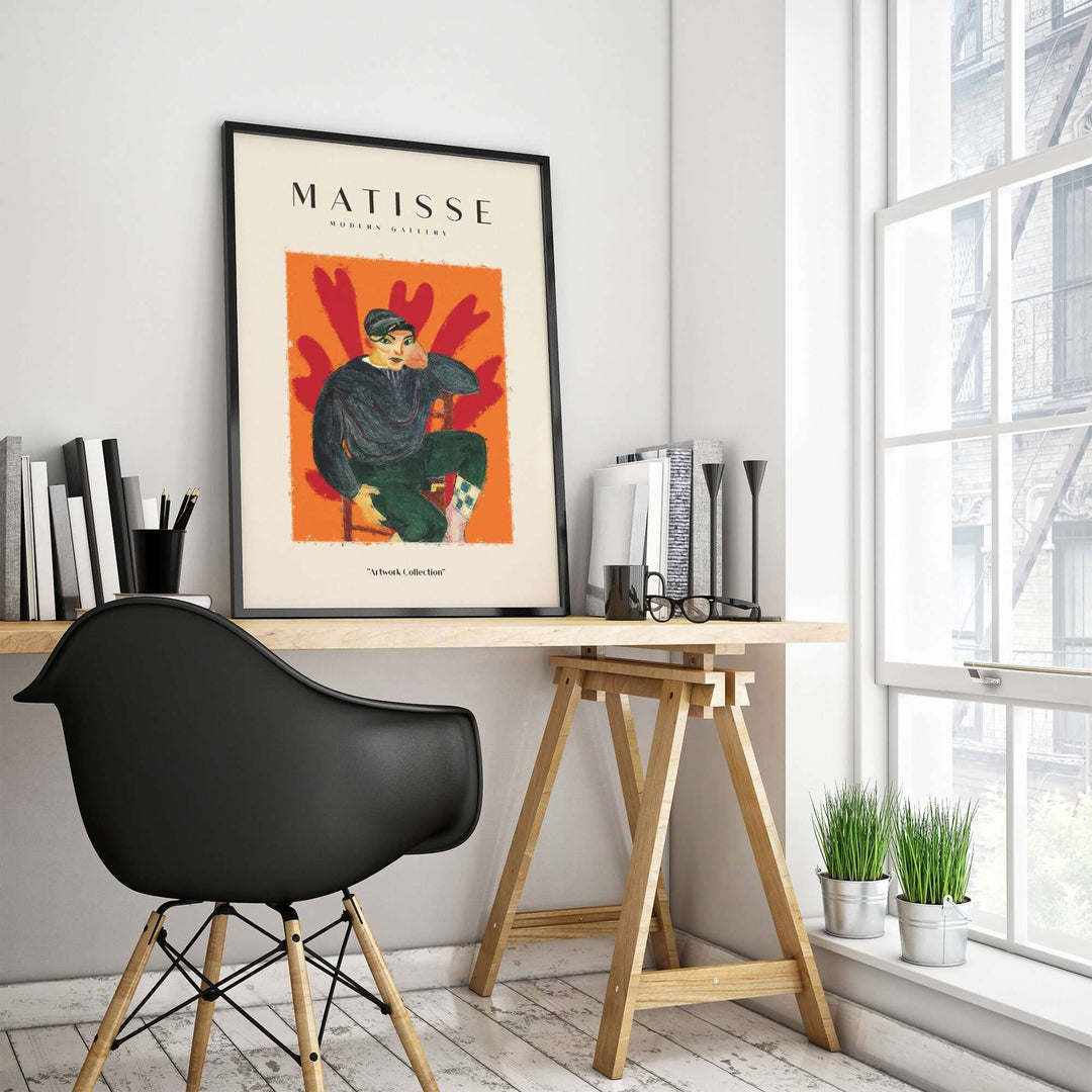 Matisse art print 'Seated Figure in Cap' poster in modern workspace, vibrant colors and abstract background.