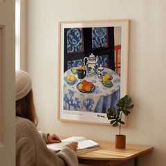 Matisse Art Prints - Still Life Blue Tablecloth Poster featuring a blue patterned tablecloth and vibrant fruit in a cozy setting.
