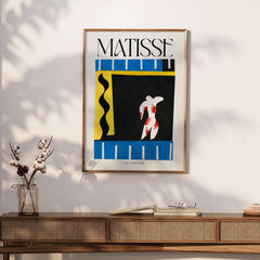 Matisse Art Print - The Clown 1943 Jazz Series Abstract Figure Poster displayed on a wall with modern decor.
