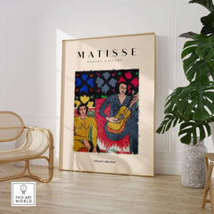 Matisse Art Prints - Two Women Guitar Interior Scene Poster displayed in a modern gallery setting with decorative elements.