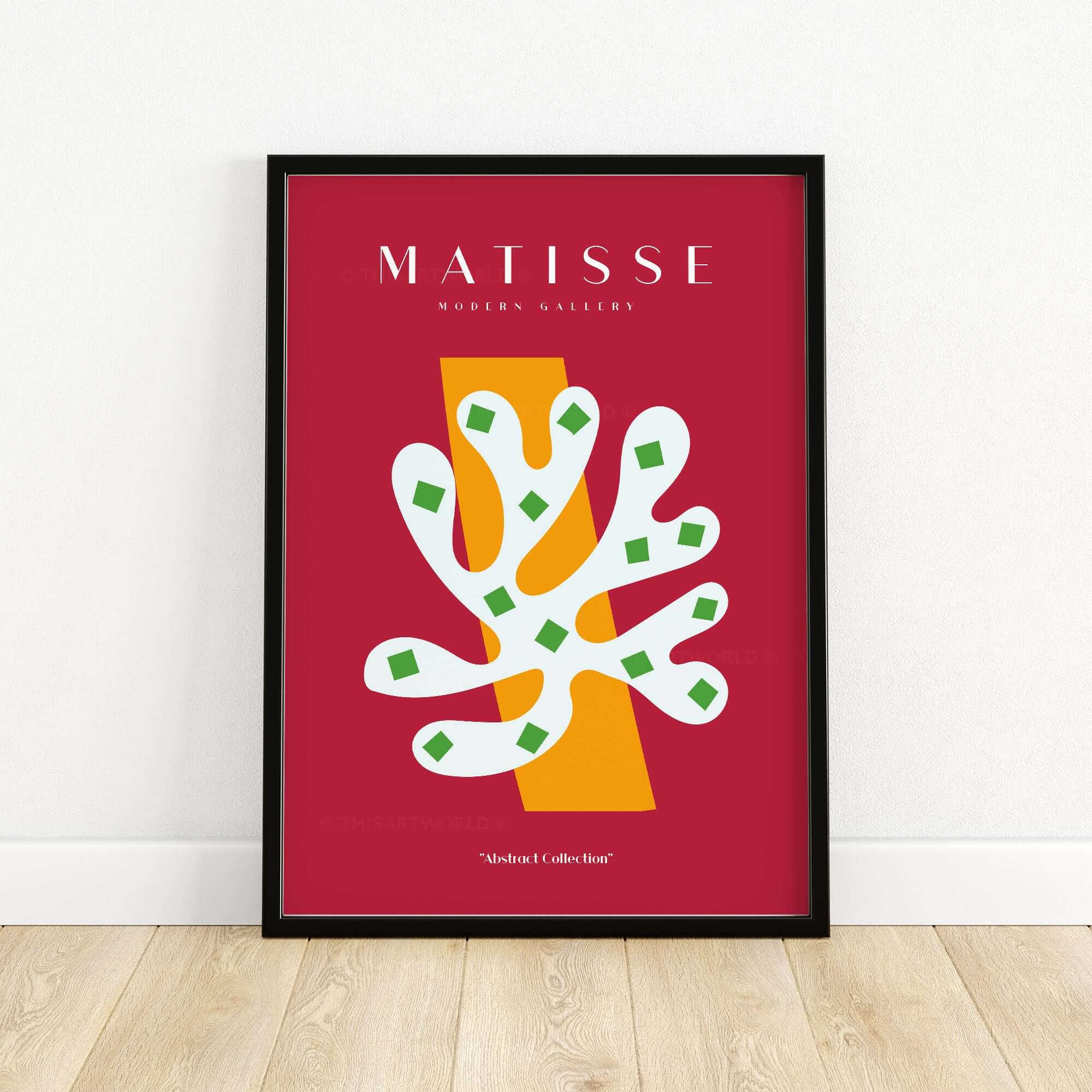 Matisse Art Prints - White Coral Abstract Green Diamonds Print displayed in a black frame on a wooden floor.