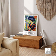 Matisse Art Prints - Woman with Blue Hat Garden Poster displayed in a stylish living room setting.