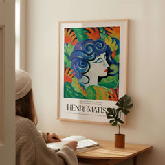 Matisse Art Prints - Woman with Flowers Abstract Art Print showcased on a wall beside a person reading.