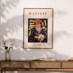 Matisse Art Prints -  Woman in Patterned Hat & Dress Poster featuring a woman with a red hat and dark dress.