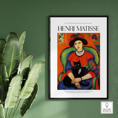 Matisse Art Prints - Woman with Black Cat Interior Poster showcasing a woman with a black cat in a colorful room.