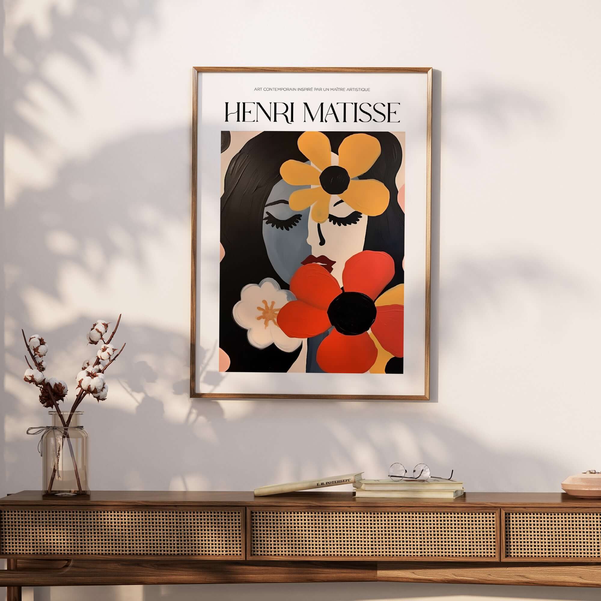 Matisse Art Prints -  Woman with Flowers Abstract Art Print displayed in a stylish frame on a wooden table.
