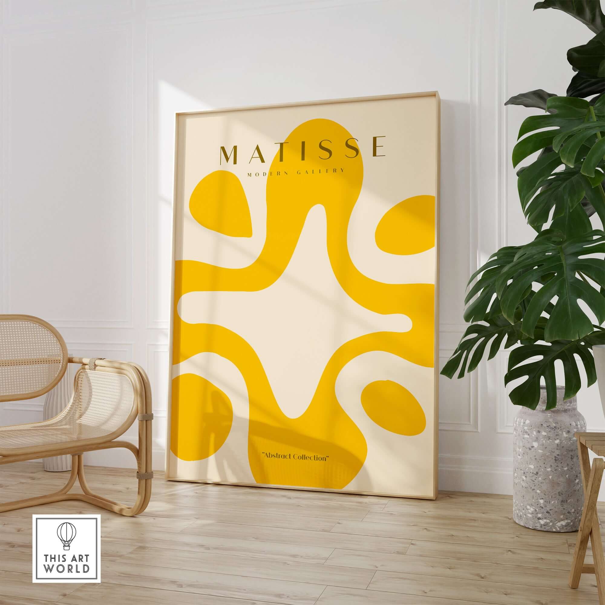Matisse Art Prints -   Yellow Abstract Fluid Shape Poster displayed in a modern home setting.