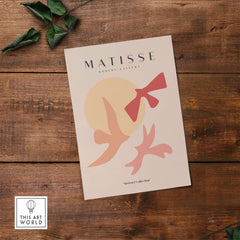 Matisse Art Prints - Abstract Birds Sun Shapes Poster showcasing abstract colors and shapes on a wooden background.