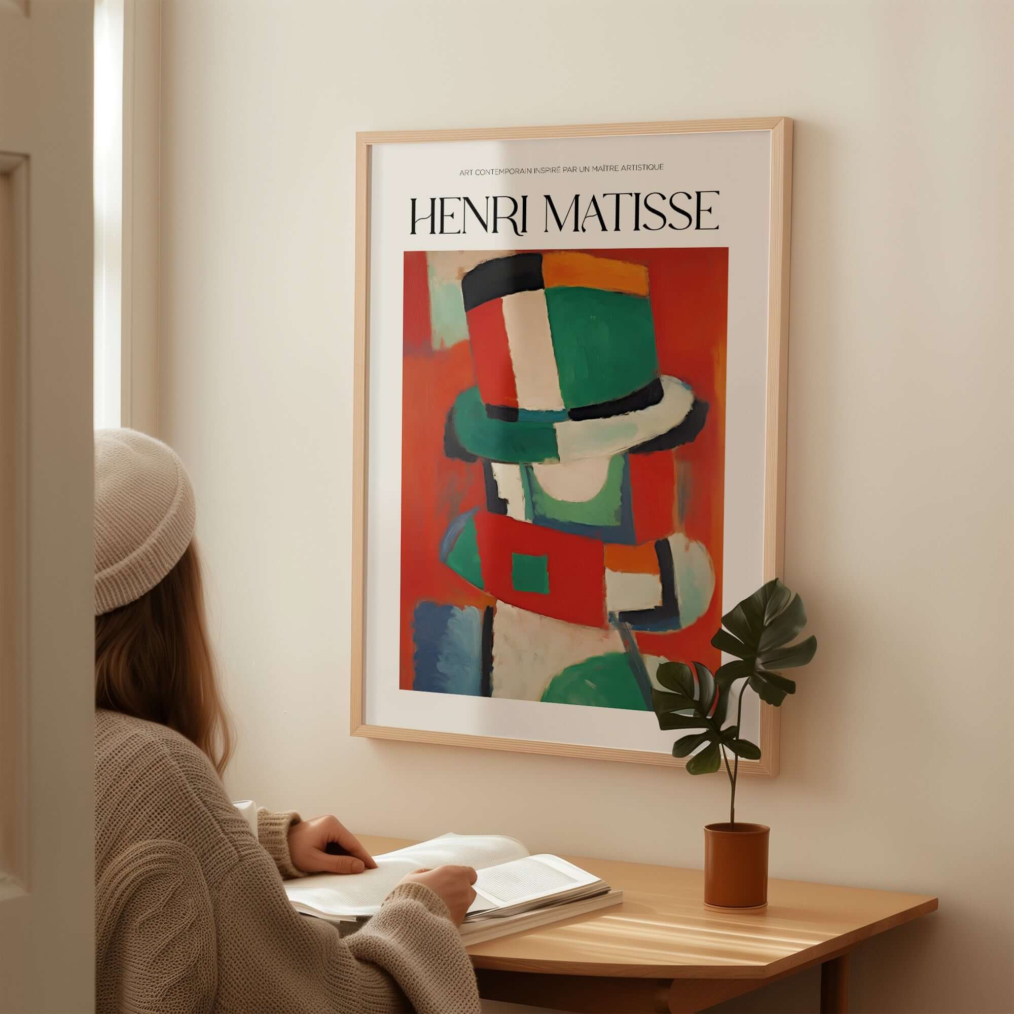 Matisse Art Prints - Abstract Figure with Hat Poster displayed on a wall, showcasing geometric vibrancy and bold colors.