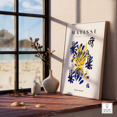 Matisse Art Prints - Abstract Floral Blue Yellow Black Poster displayed by a window with beach view, modern decor.