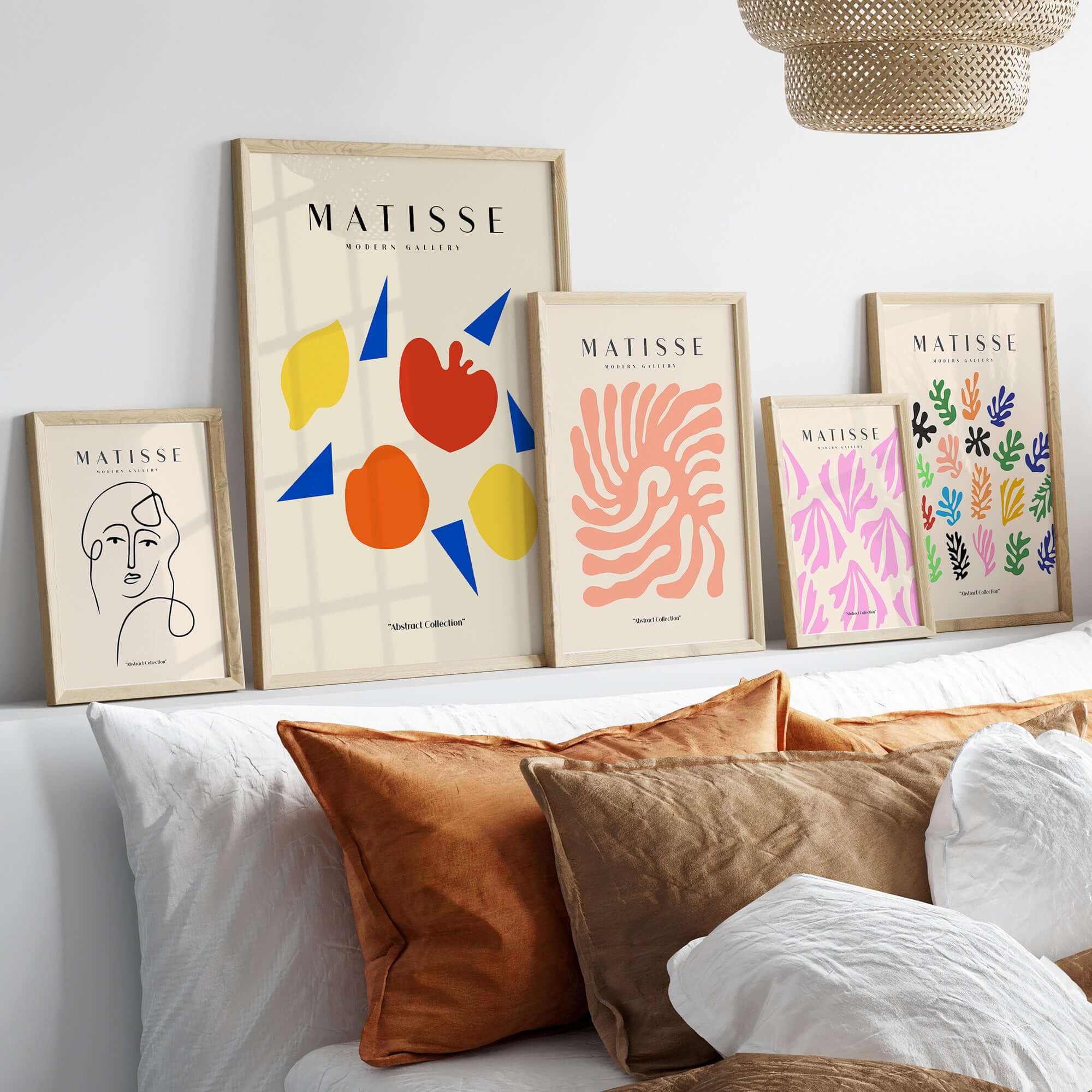 Matisse Art Prints - Abstract Fruit Shapes Blue Triangles Poster displayed on a wall with various framed prints.
