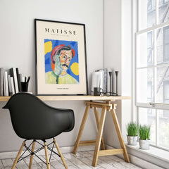 Matisse Art Prints -  Abstract Man Portrait Poster displayed in a stylish interior with books and plants.