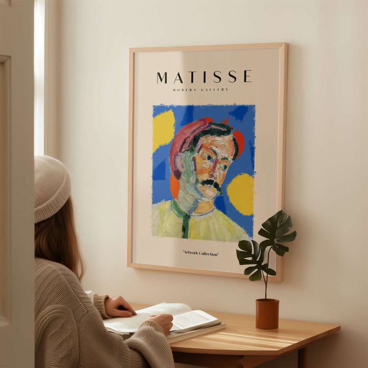 Matisse Abstract Man Portrait Poster featuring vibrant colors, displayed in a cozy room setting.