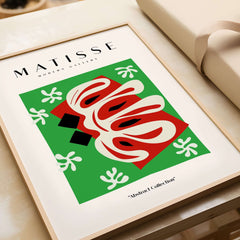 Matisse Art Prints - Abstract Shape Red Green Poster displayed in a modern frame with vibrant colors and graphic design.