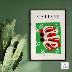 Matisse Art Prints - Abstract Shape Red Green Poster displayed in a modern gallery setting against green walls.