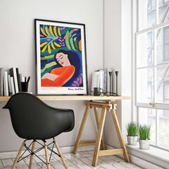 Matisse Art Prints - Abstract Woman in Foliage Poster displayed in a bright interior with a stylish chair and desk.