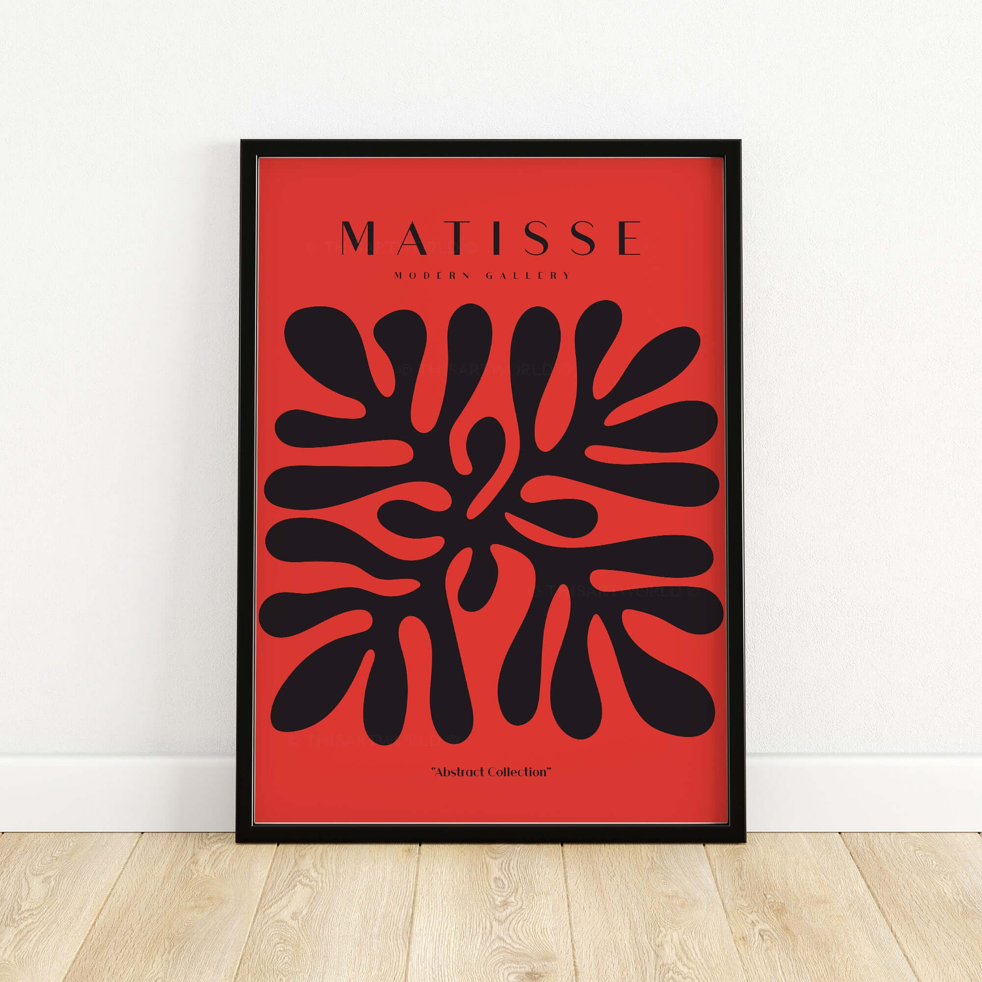 Matisse Art Prints -  Black Abstract Coral Shape Red Poster displayed on a wall, showcasing bold black shapes on red background.