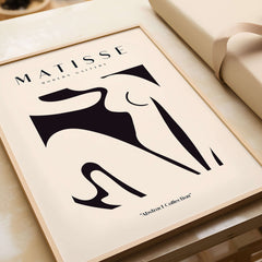 Matisse Art Prints - Black Abstract Nude Figure Poster framed art print showcasing minimalist design in black and beige.
