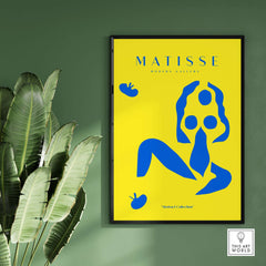 Matisse Art Prints - Blue Nude Abstract Figure Yellow Poster displayed against green wall with contemporary design elements.