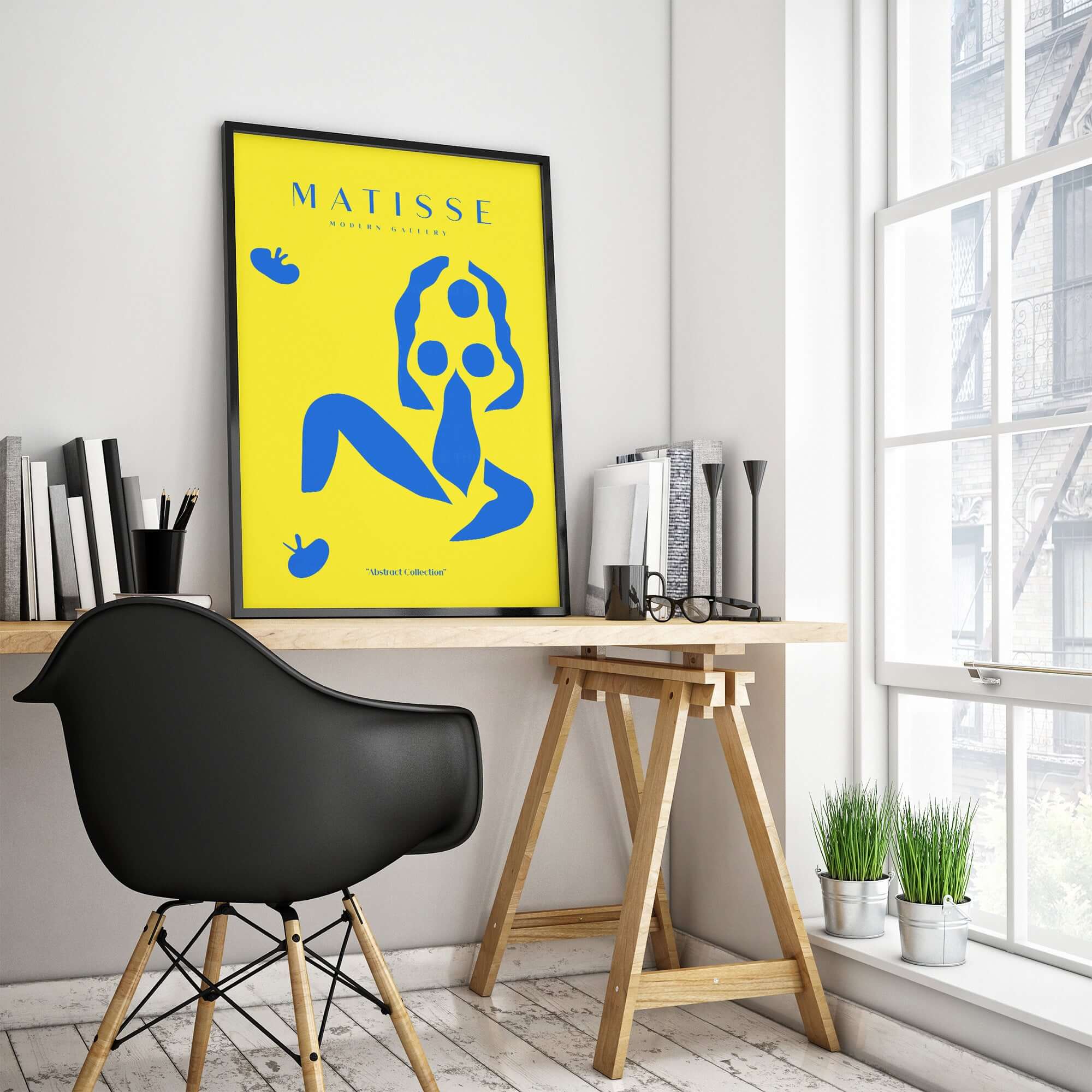 Matisse Art Prints - Blue Nude Abstract Figure Yellow Poster displayed in a modern workspace with vibrant yellow background.