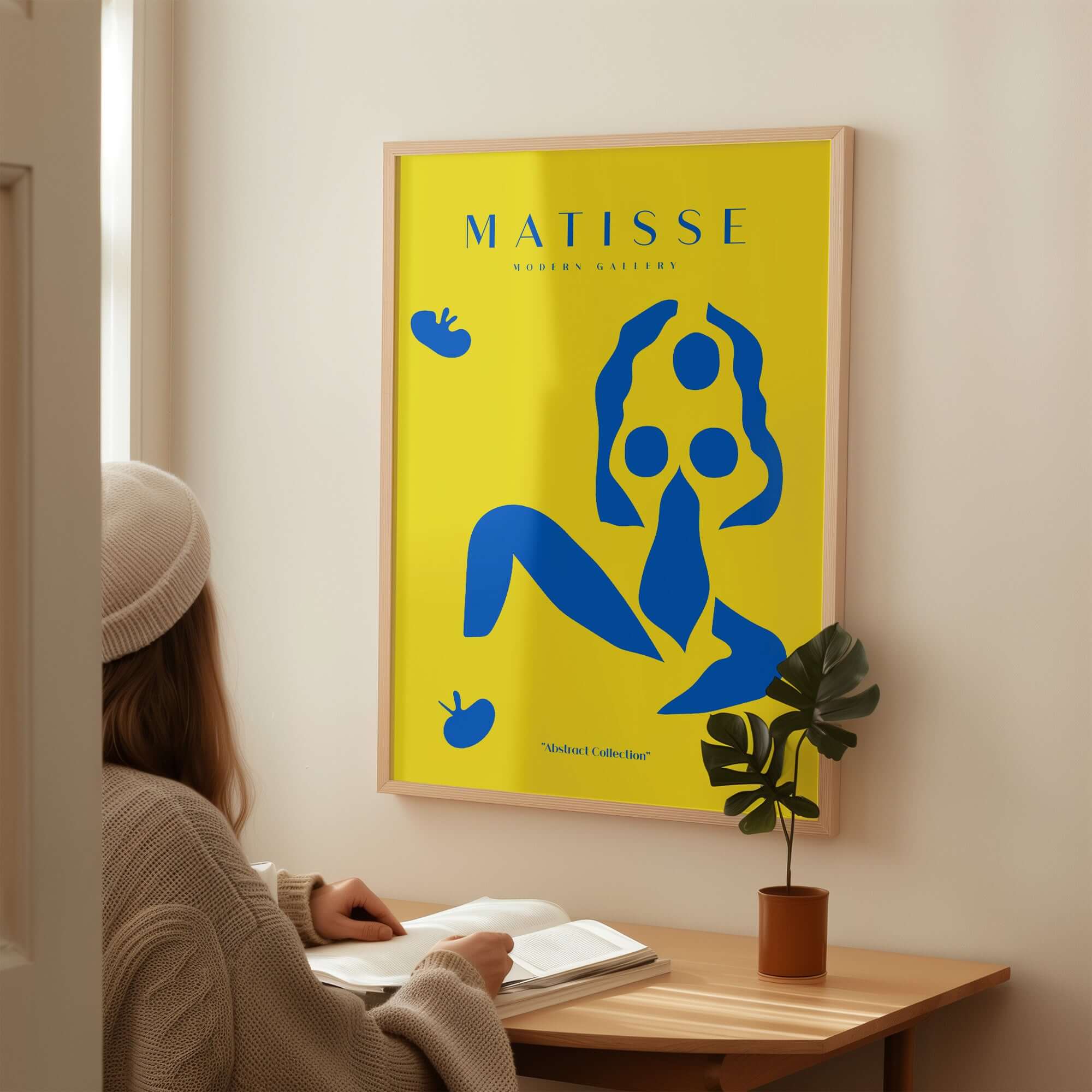 Matisse Art Prints - Blue Nude Abstract Figure Yellow Poster displayed on wall, vibrant blue figure on yellow background.
