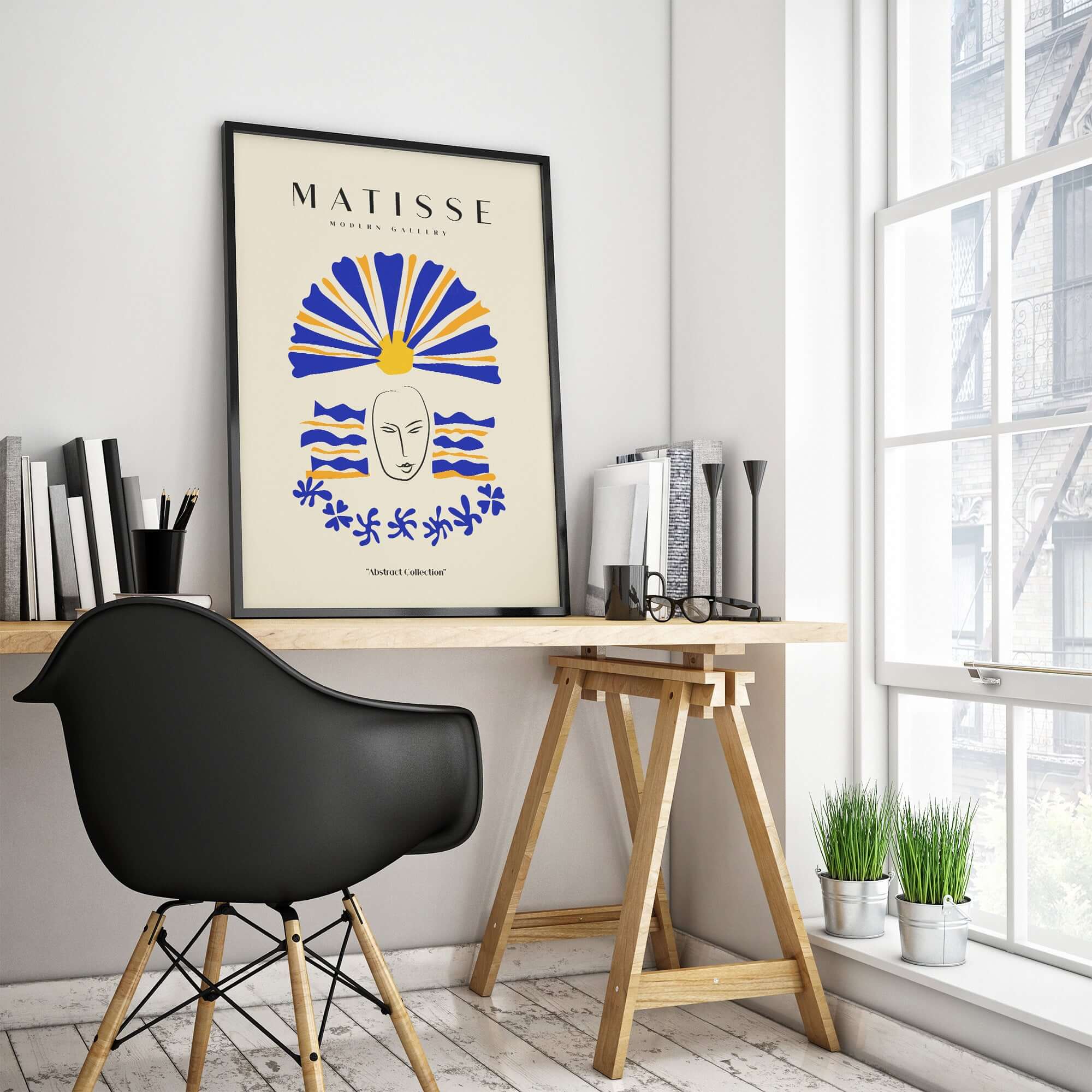 Matisse Art Prints -  Blue & Yellow Abstract Face displayed in a modern workspace with a stylish chair and decor.