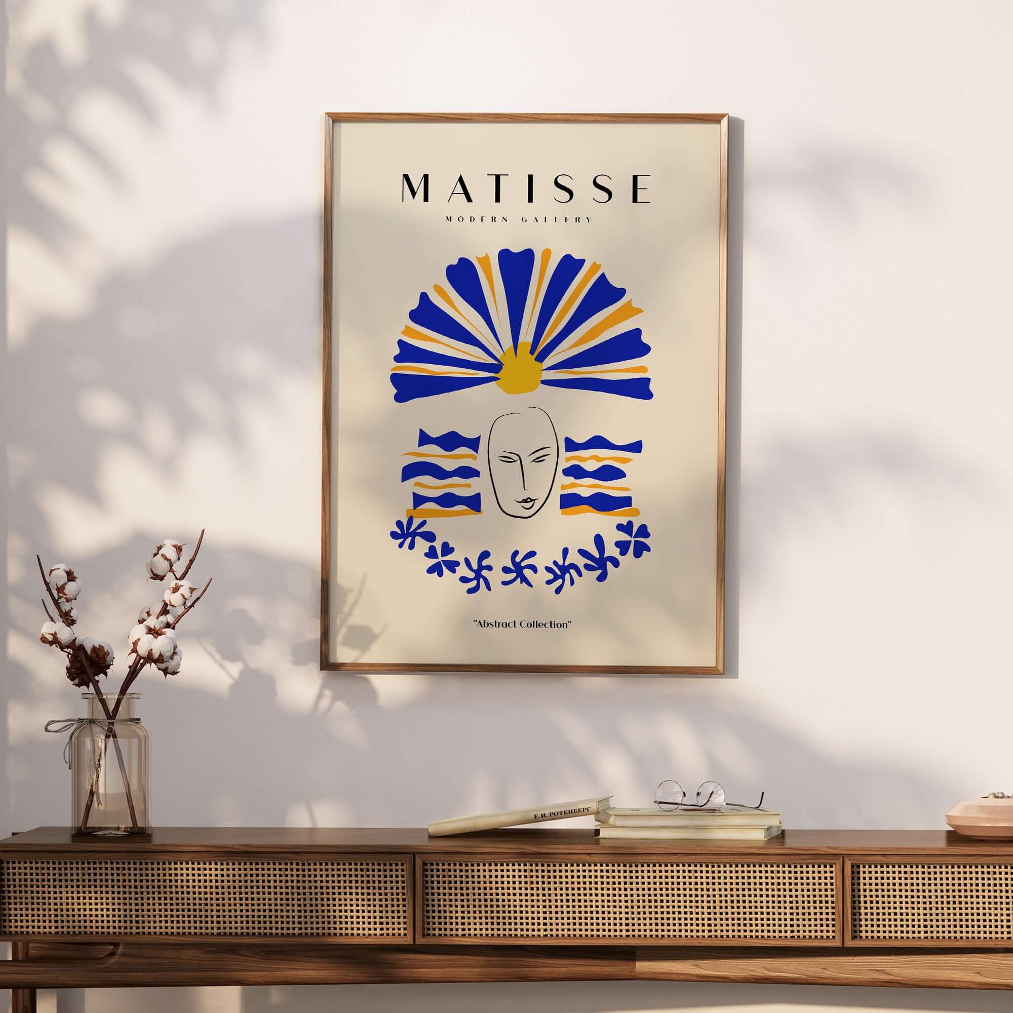 Matisse Art Prints -  Blue & Yellow Abstract Face on a wall with a decorative sunflower headdress and wave patterns.
