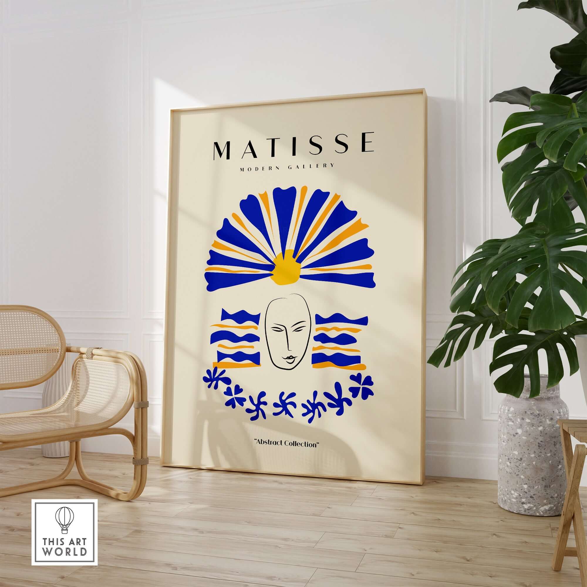 Matisse Art Prints -  Blue & Yellow Abstract Face wall art featuring a minimalist line-drawn face and vibrant colors.