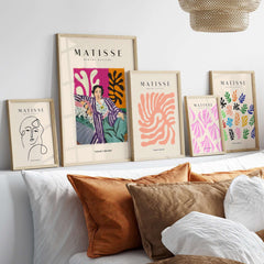 Matisse Art Prints - Reclining Woman Striped Robe Abstract Print displayed in frames on a stylish wall.