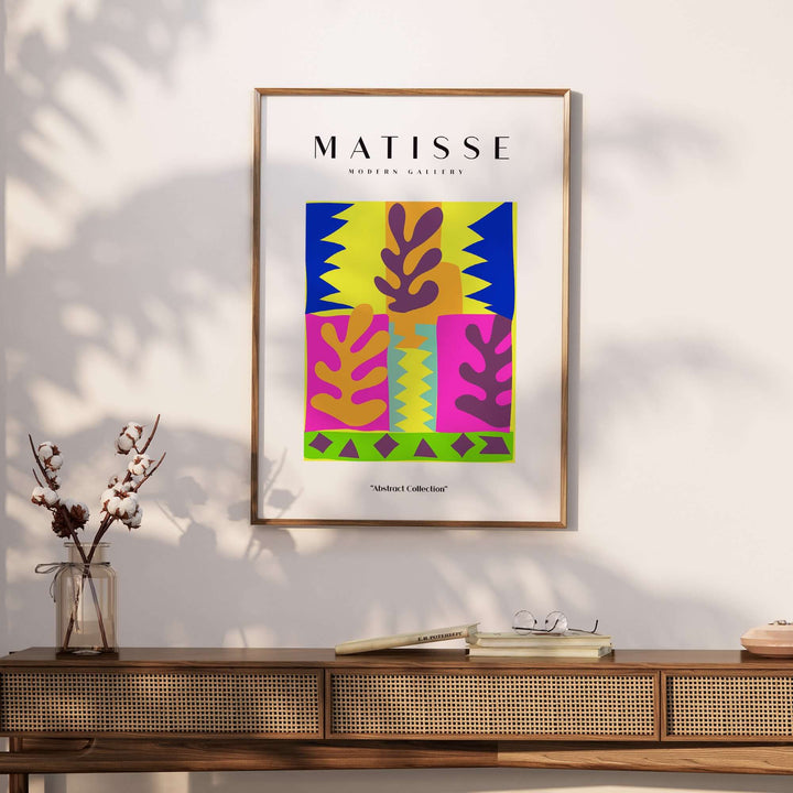 Matisse Art Print featuring colorful abstract leaves and blocks in vibrant hues displayed on a wall.