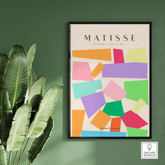 Matisse Art Prints - Colorful Geometric Shapes Abstract Print displayed in a modern frame against a green wall.