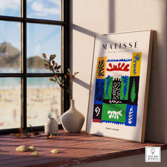 Matisse Art Prints - Complex Abstract Botanical Patchwork Poster displayed by a window with beach view.