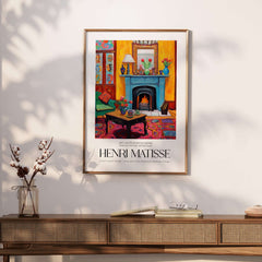 Matisse Art Prints - Cozy Fireplace Interior Poster showcasing a vibrant living room with lit fireplace and colorful decor.