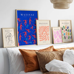 Matisse Art Prints -  Dancing Figures Pattern Red Blue Poster displayed on a shelf with other art pieces.