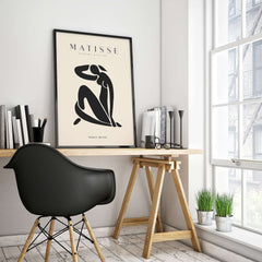 Matisse Art Prints - Figurative Lady Poster Art displayed in a modern workspace with black chair and wooden desk.