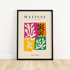 Matisse Art Prints - Four Block Abstract Leaves Poster displayed in a modern frame on a wooden floor.