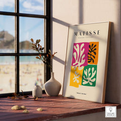Matisse Art Prints - Four Block Abstract Leaves Poster displayed in a sunny room with a beach view.