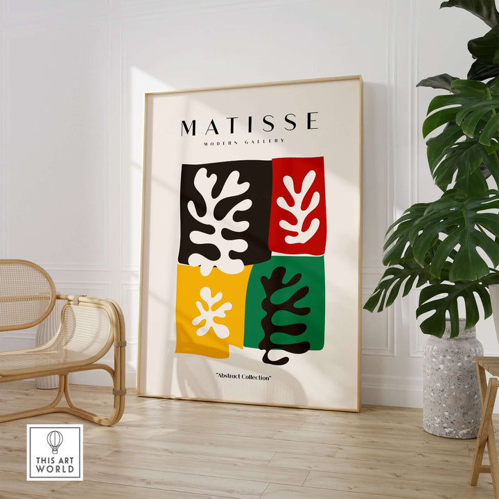 Matisse art print featuring four color blocks with abstract leaf designs in black, red, yellow, and green.