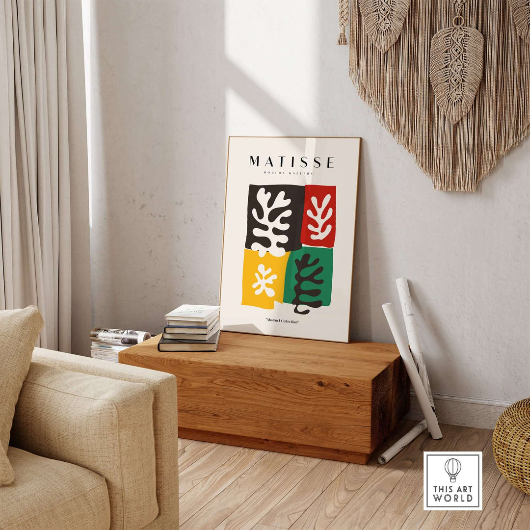 Matisse art print featuring four abstract color blocks with leaves, displayed in a modern living room setting.