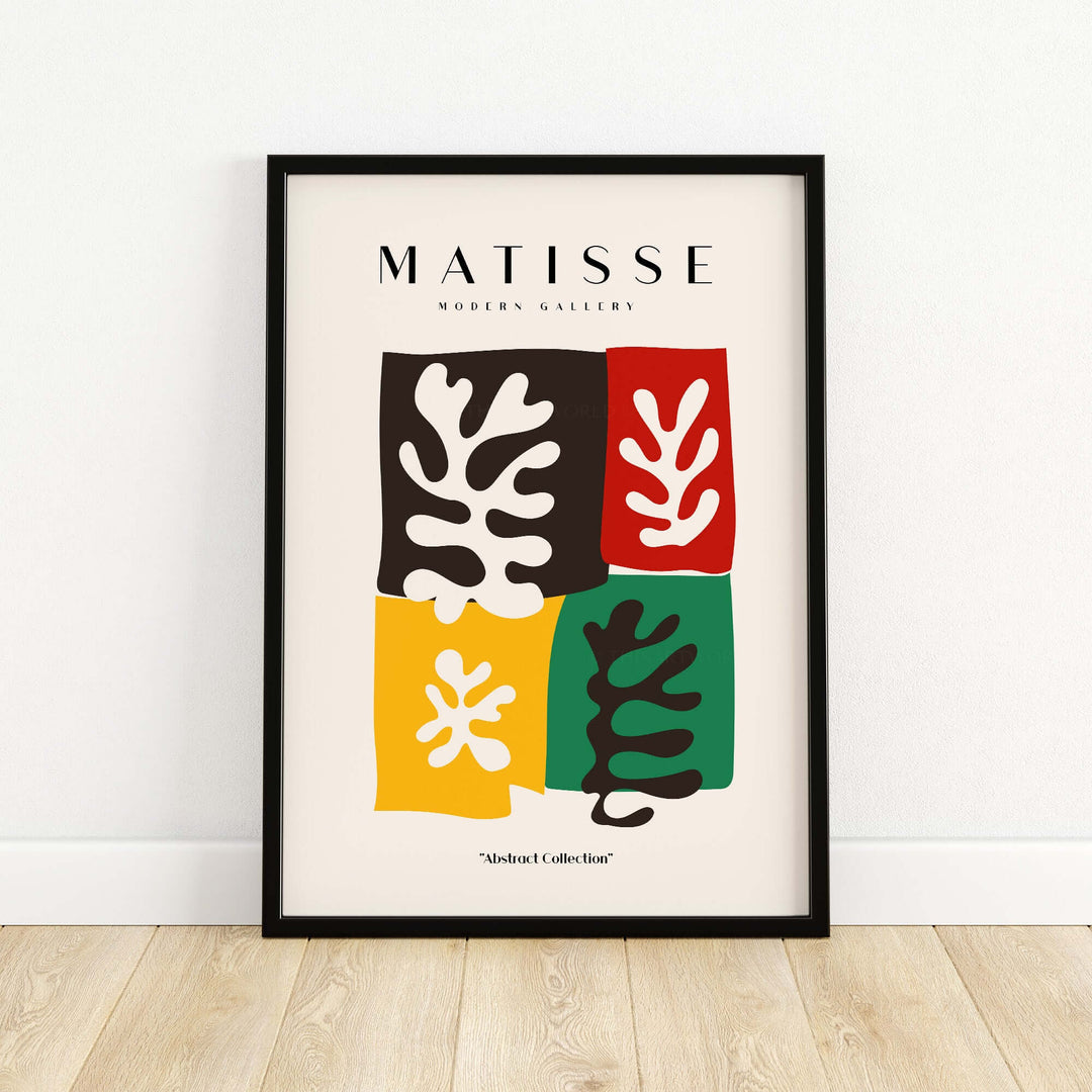 Matisse Art Print featuring four color blocks with abstract leaves in black, red, yellow, and green on a gallery wall.