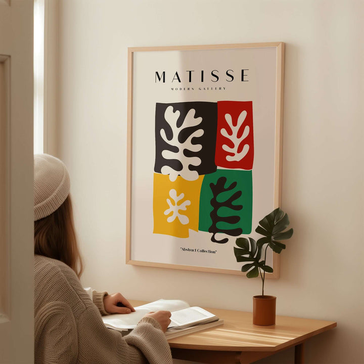 Matisse Art Print featuring four color blocks with abstract leaves in bold tones, enhancing modern decor.