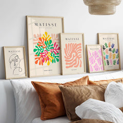 Matisse Art Prints - Interlocking Colorful Leaves Abstract Print displayed on a wall. Vibrant colors and frames.