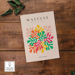Matisse Art Prints - Interlocking Colorful Leaves Abstract Print featuring vibrant leaves in red, yellow, green, and pink on beige.