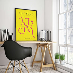 Matisse Art Prints - Jazz Pink Lettering Yellow Poster Art displayed in a modern workspace with stylish decor.