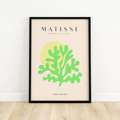 Matisse Art Prints - Lime Green Coral Abstract Sun Print displayed in a modern black frame on a light beige background.