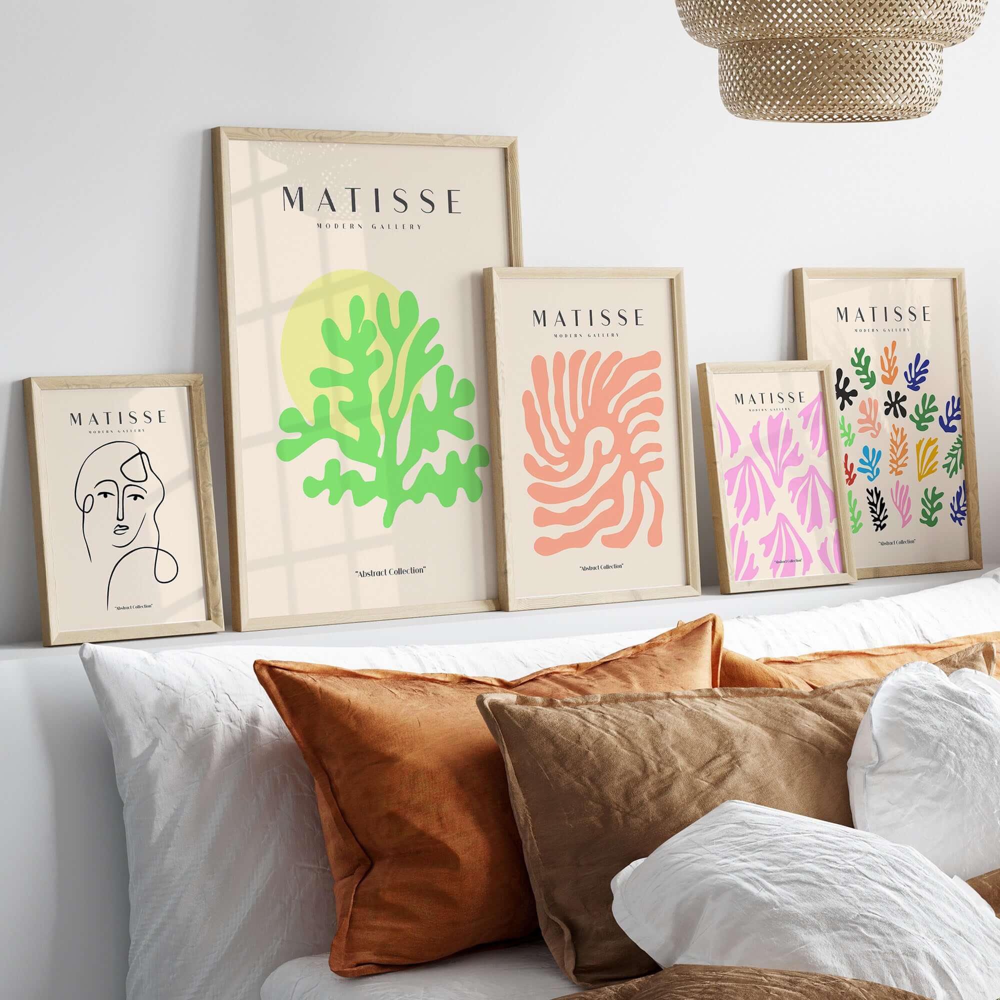 Matisse Art Prints - Lime Green Coral Abstract Sun Print displayed in a modern interior with decorative cushions.